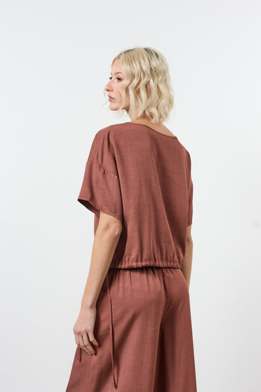 Blouse manches courtes élastiquée à la taille